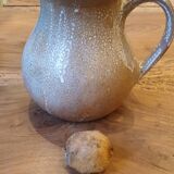 Handmade enameled stoneware pitcher