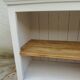 Craft furniture enhanced in pearl gray, shelves and top in raw wood.