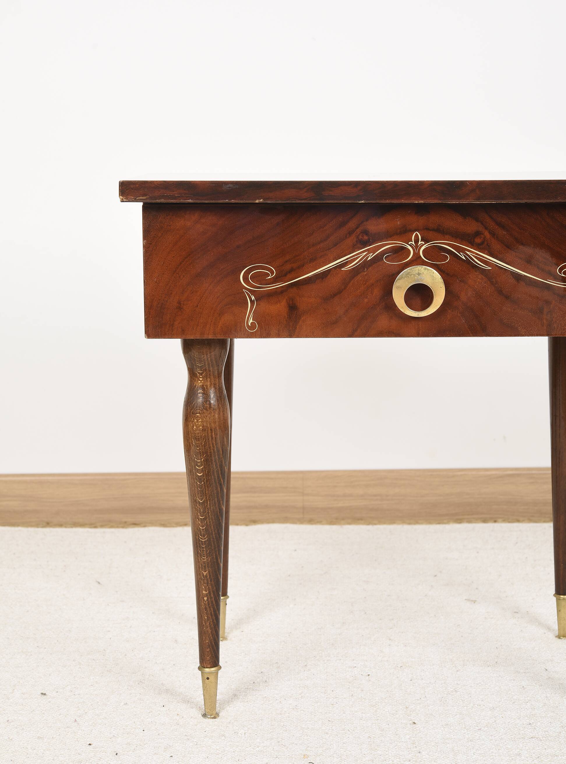 Vintage bedside table from the 70s in varnished wood.