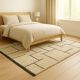 Beige Berber rug with structured lines.