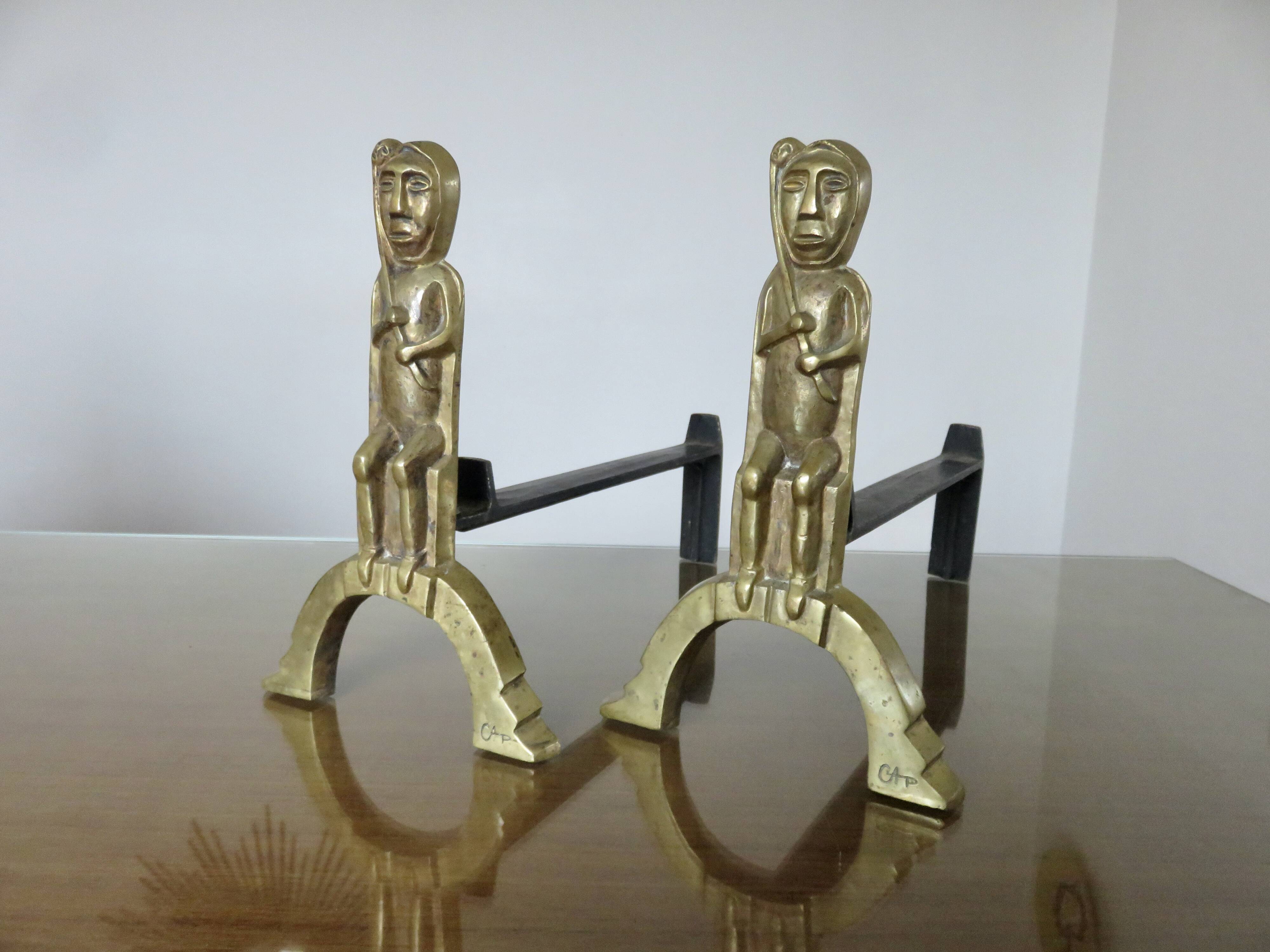 Anton Prinner, pair of Shaman fire dogs in gilded bronze, monogrammed, 1930