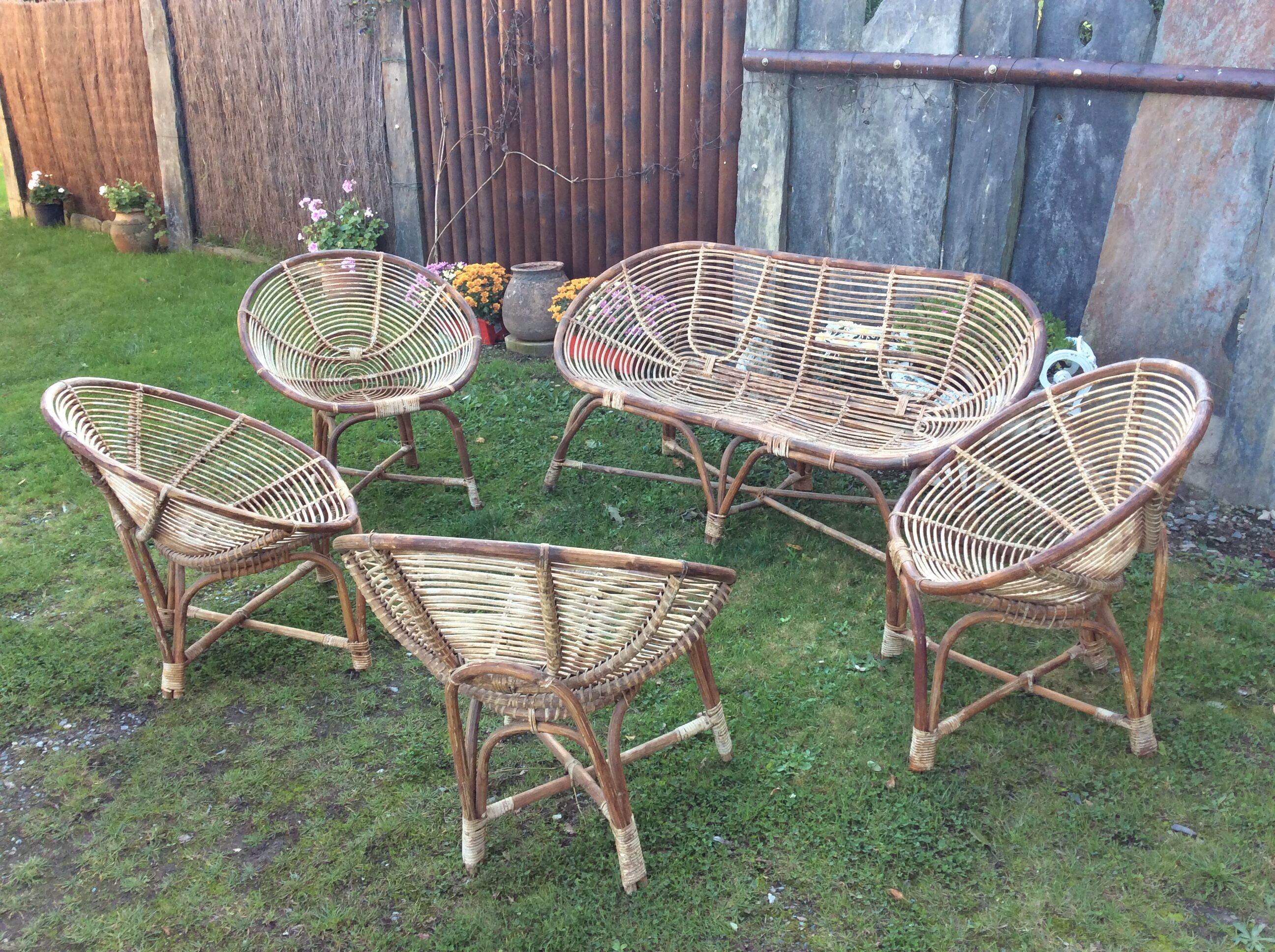 Set of 4 armchairs and 1 vintage rattan bench (5 pieces) inseparable.