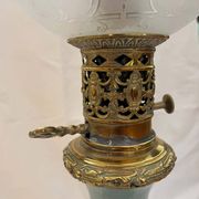 Oil lamp in celadon and bronze with its original glass globe, 19th century.