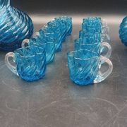 Cabaret Portieux liqueur service with 10 blue and clear glasses.
