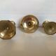 Trio of brass candle holders