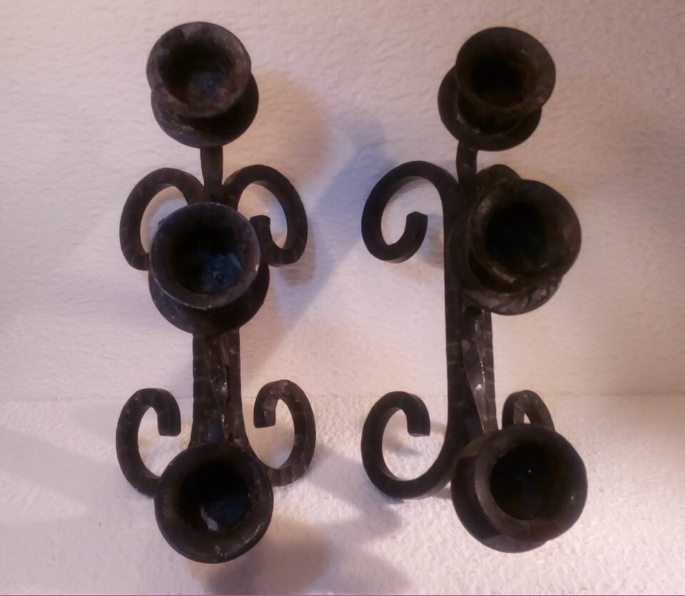 Pair of sconces in wrought iron