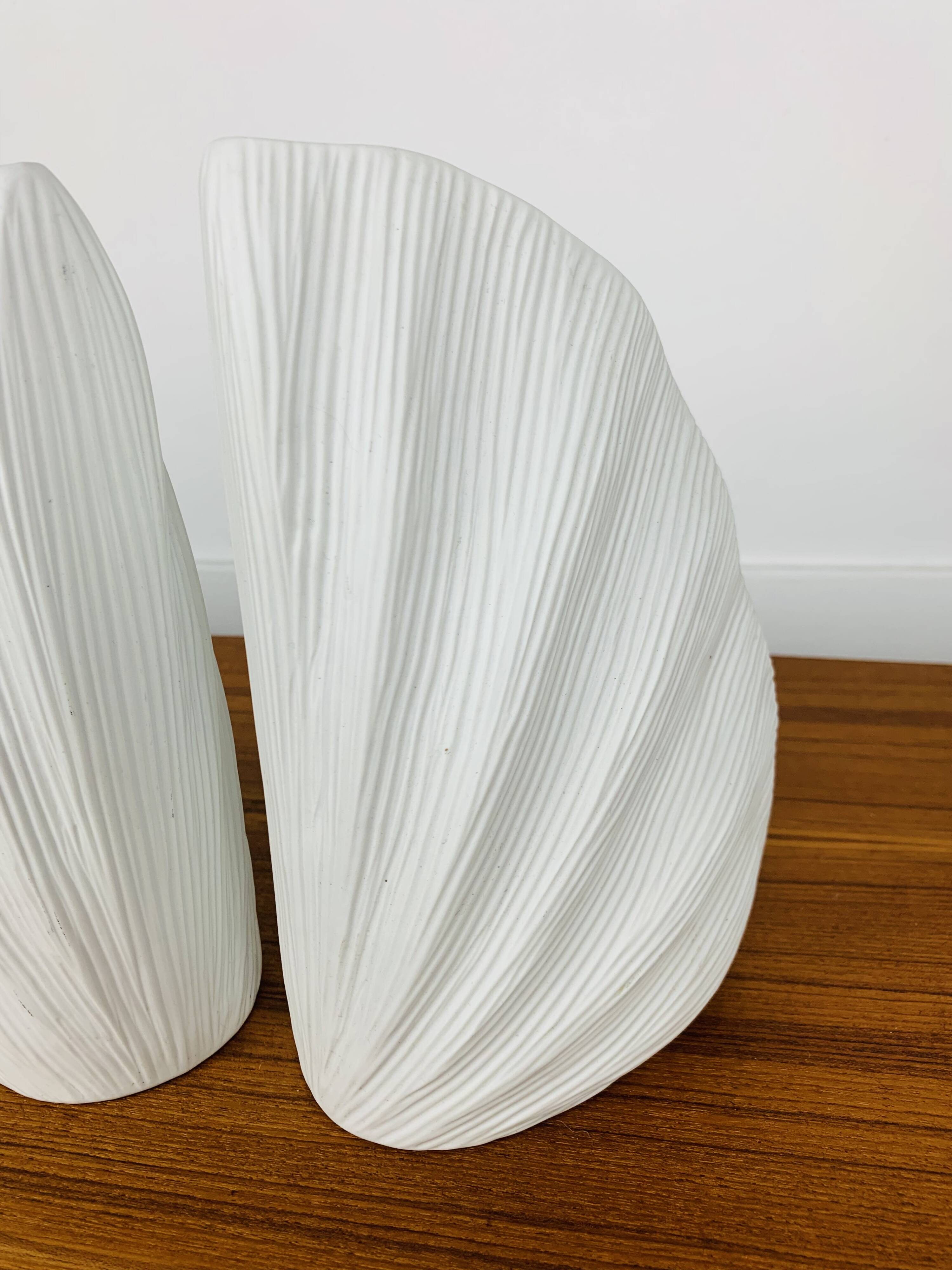 Pair of white ceramic coral vases, bookends