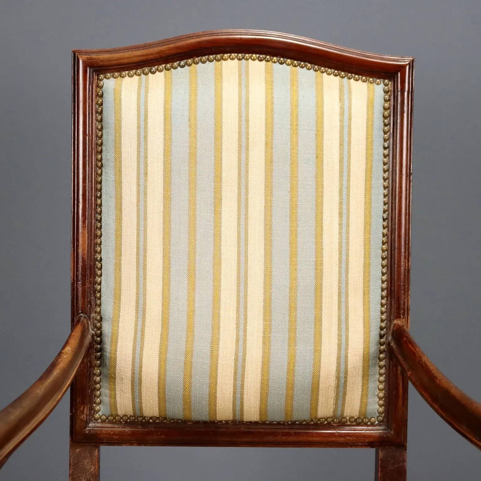 Antique Baroque-style walnut armchair, upholstered, 19th century.