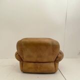 Pair of brown leather armchairs