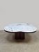 Table basse en travertin du milieu du siècle, style Jean Royère