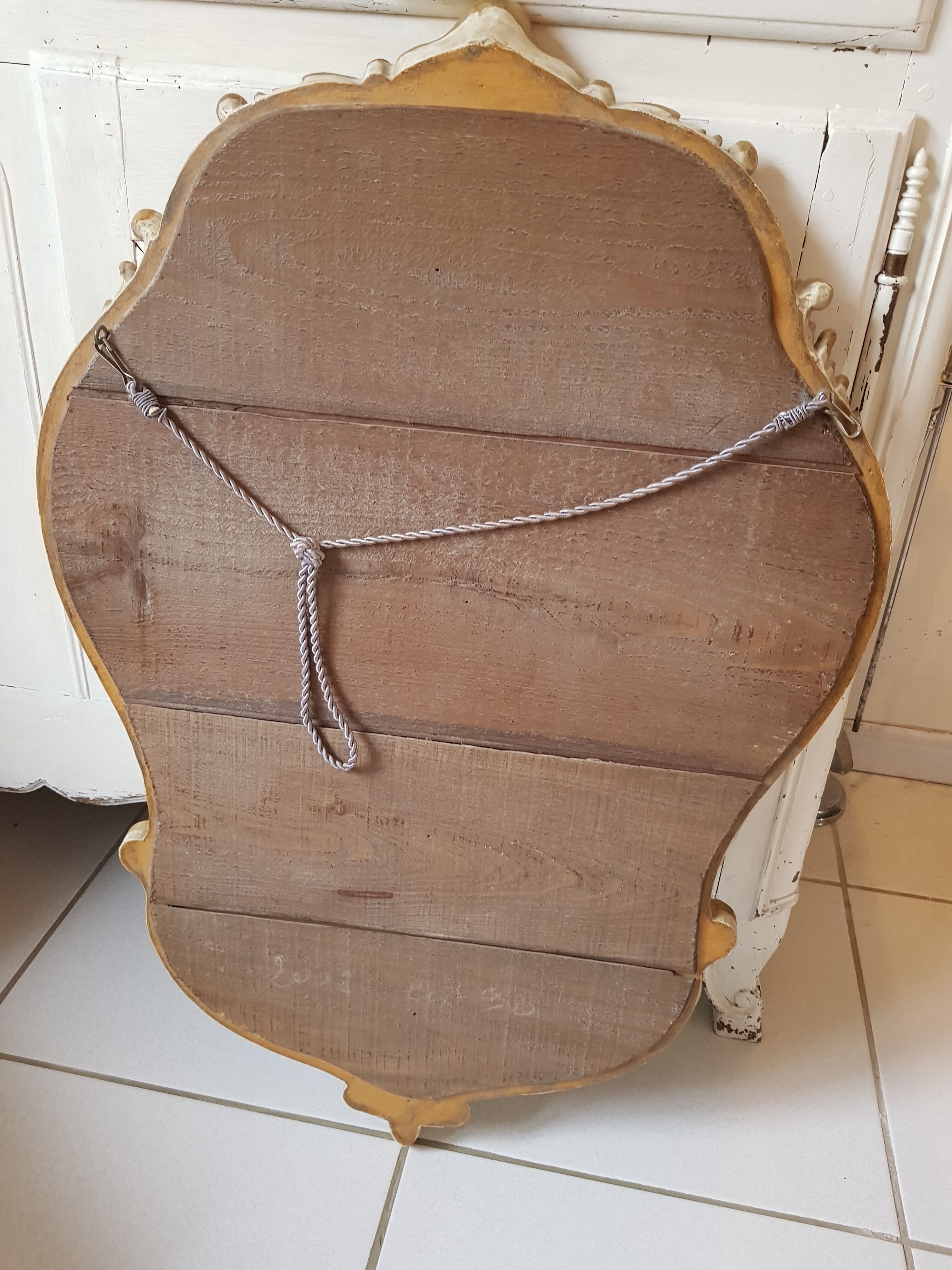 Miroir style Louis XV en bois sculpté doré 90x58cm