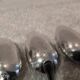 12 silver-plated metal teaspoons by Apollo silversmiths, decorated with fillets, 14.2cm