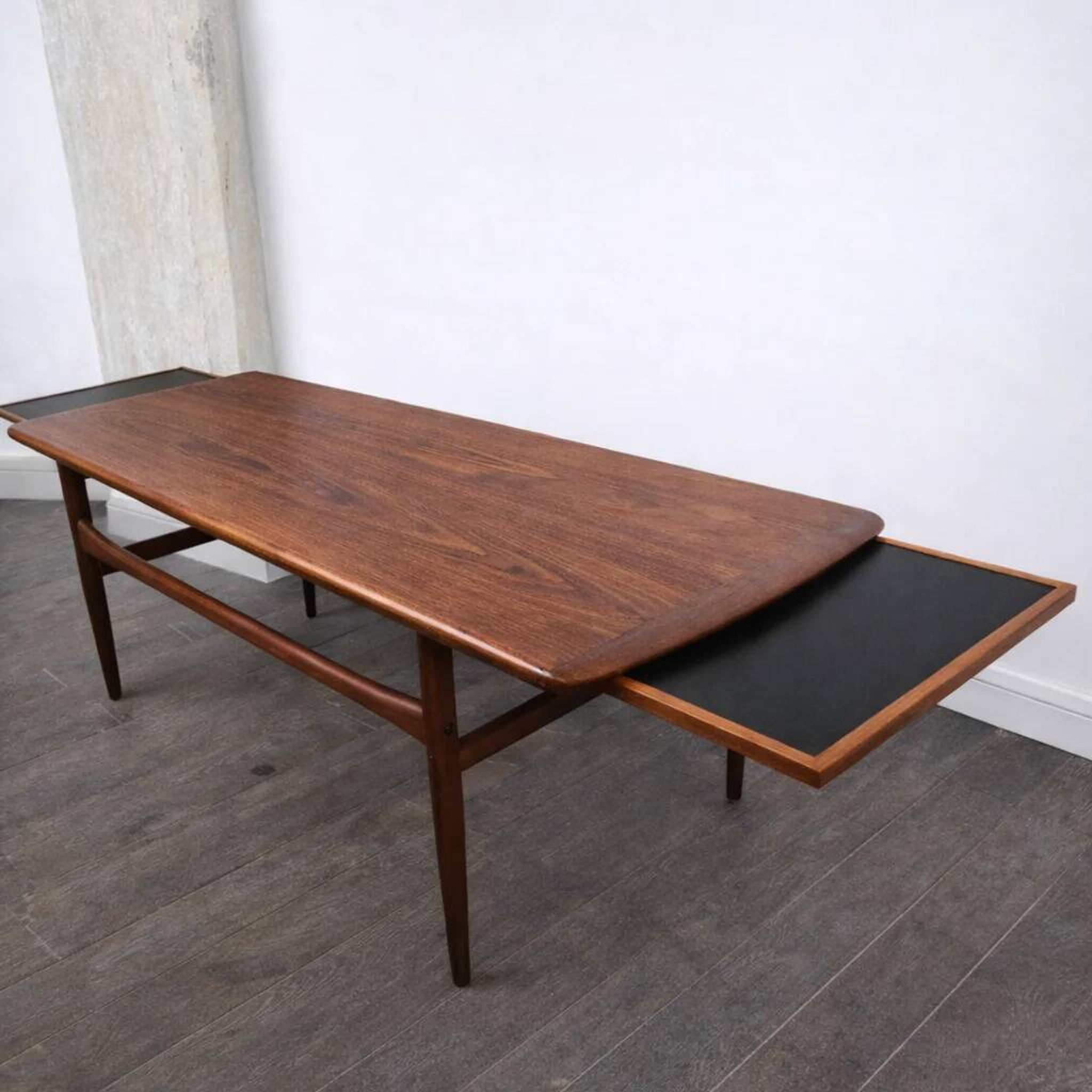 Teak coffee table with retractable tops attributed to Robert Christensen for Arrebo Mobler, Denmark, 1960.