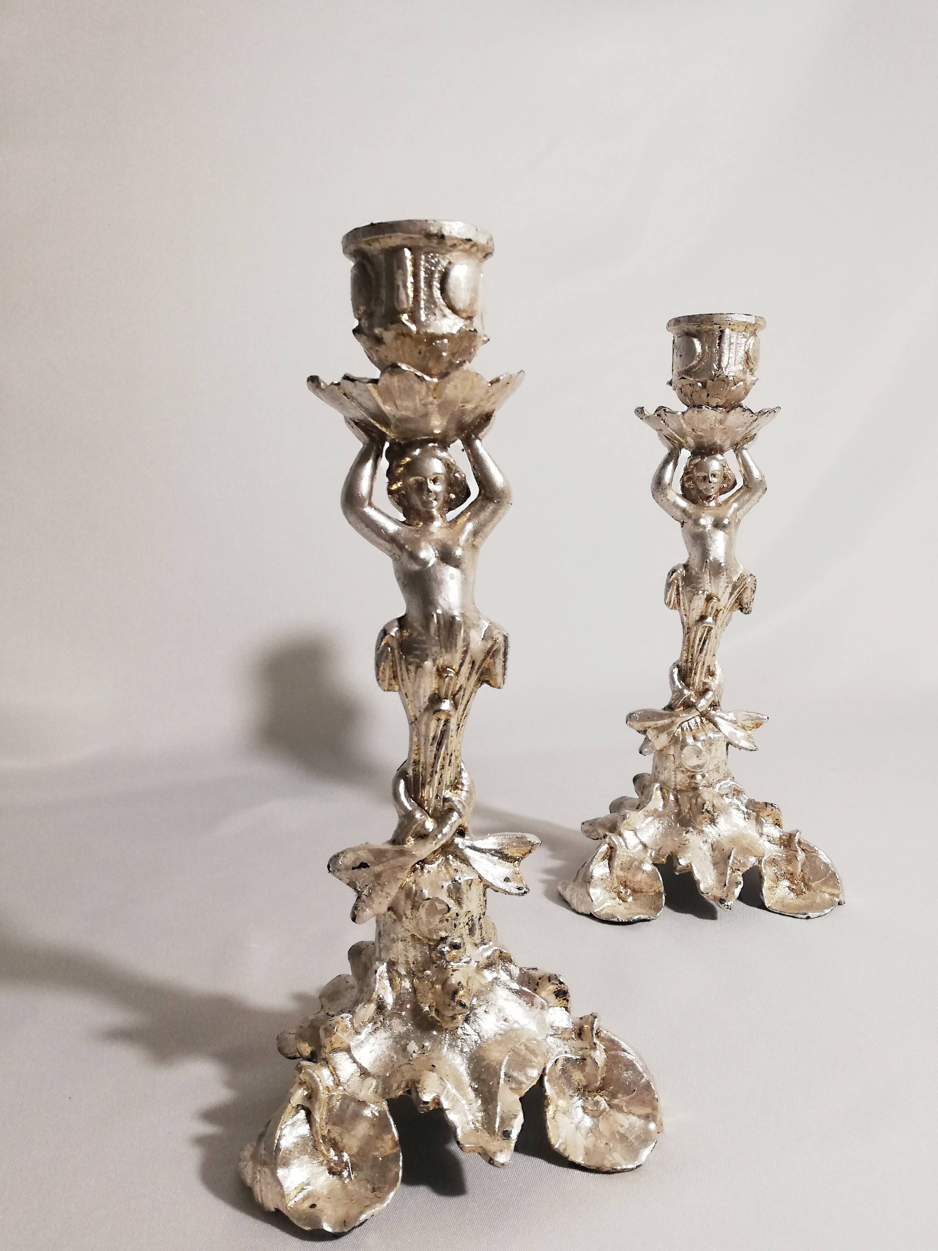 Pair of candlesticks restored to silver leaf