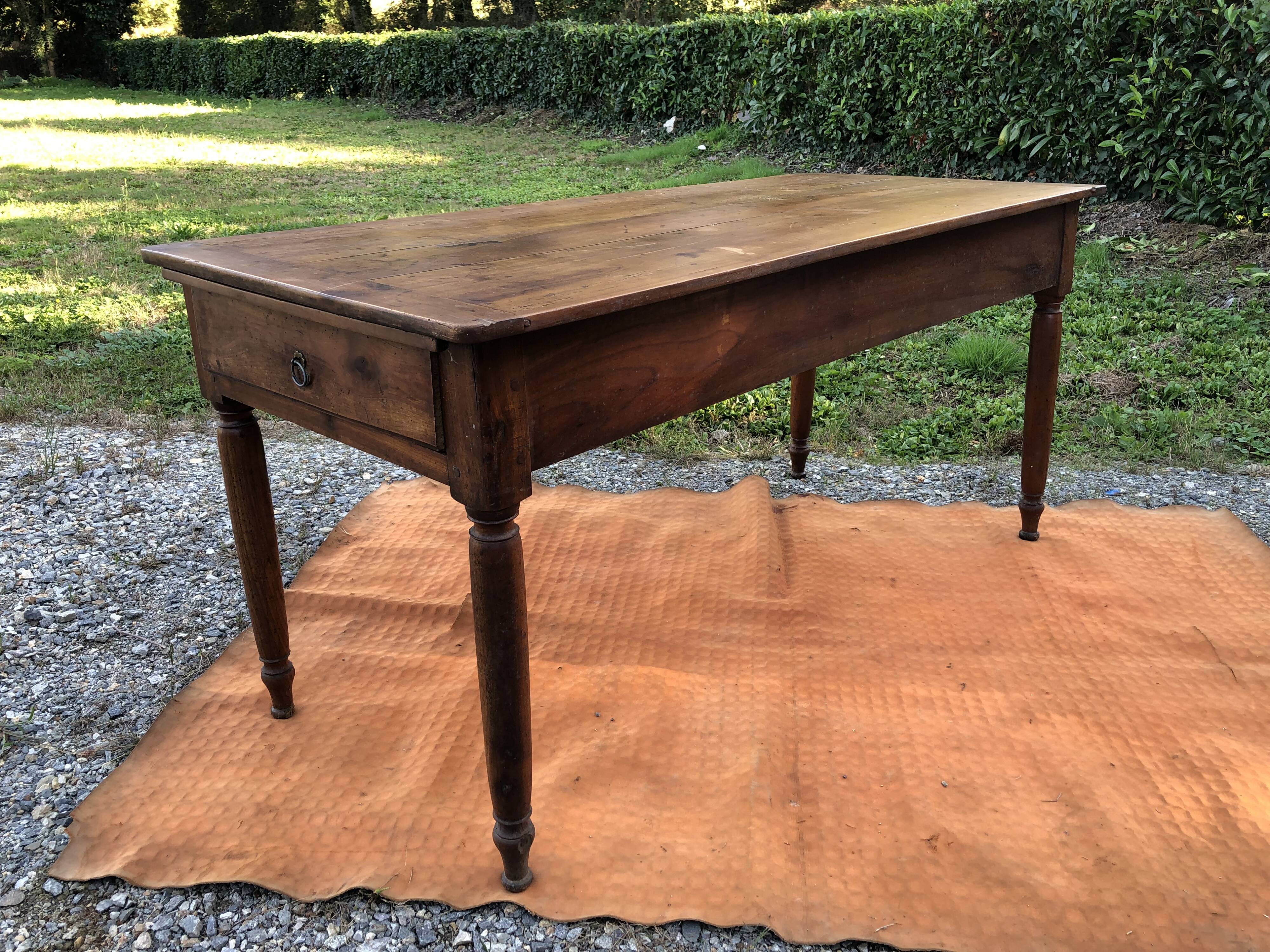 Antique cherry wood farm table with turned base with 2 drawers and 1 pull