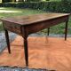 Antique cherry wood farm table with turned base with 2 drawers and 1 pull