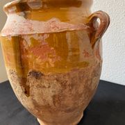Old grease pot in glazed yellow terracotta, France nineteenth century