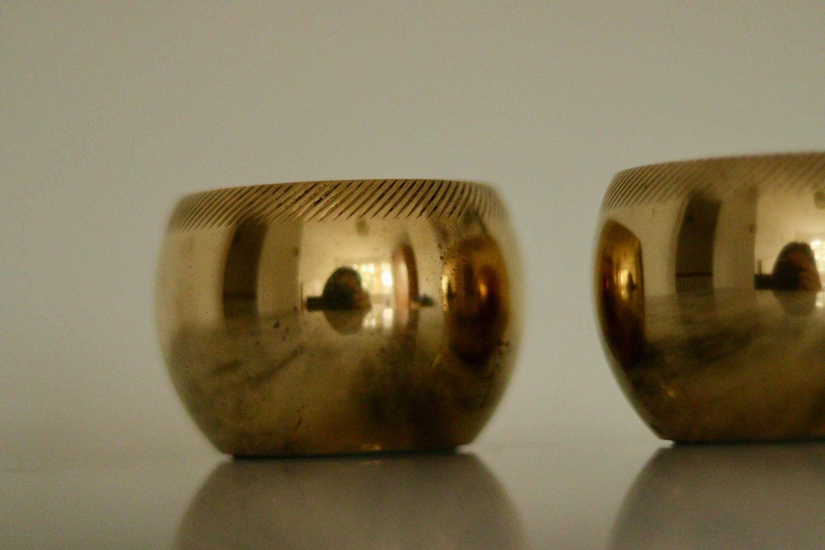 Pair of Swedish brass candlesticks from the mid-century by Skultuna.
