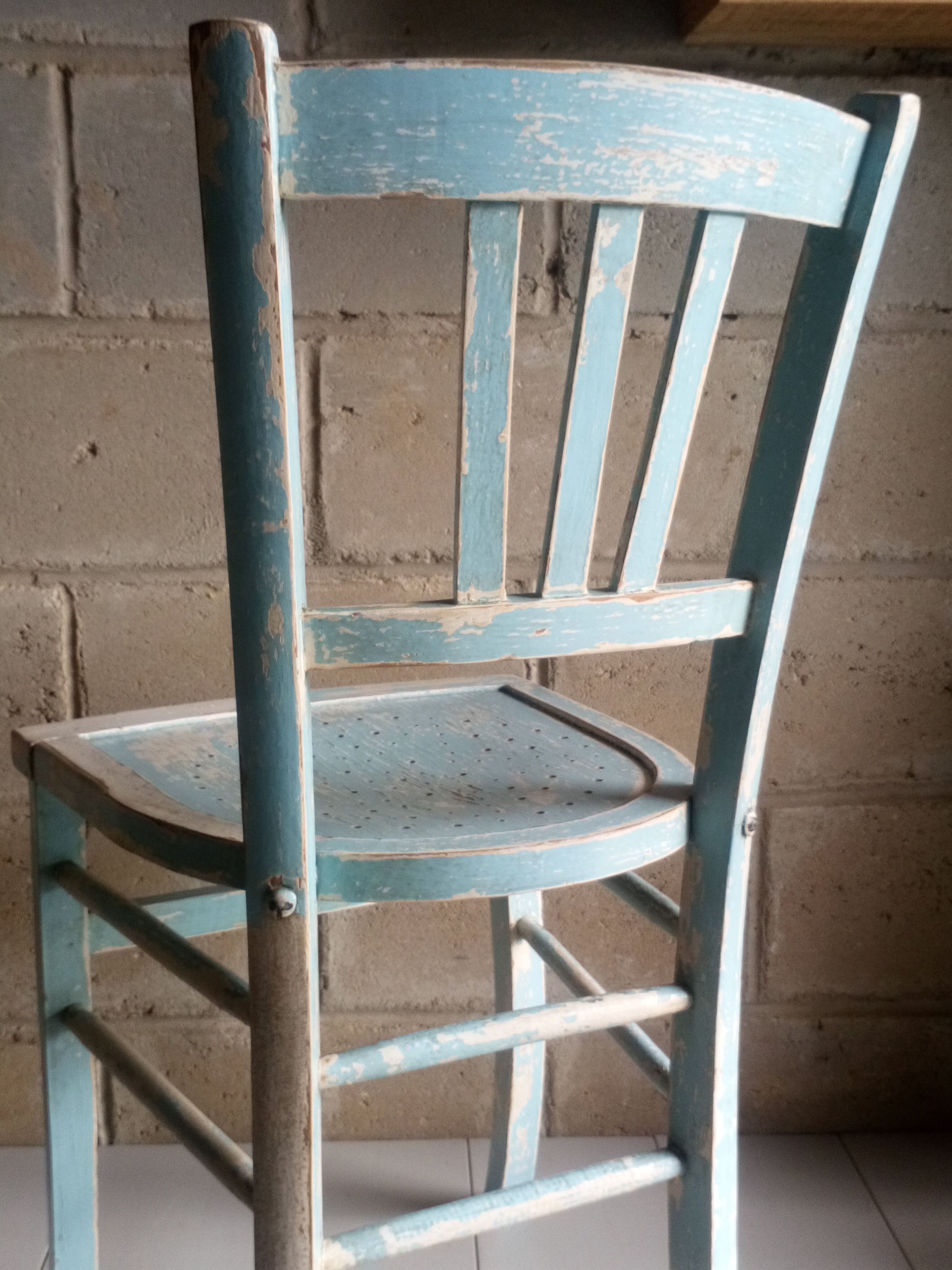Blue and white patinated old bistro chair