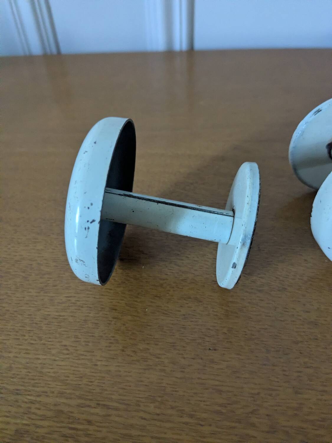 Two vintage coat hooks