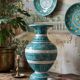 Vintage turquoise ceramic baluster vase with incised decoration.