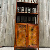Library shelf, vintage rattan storage unit and canning.