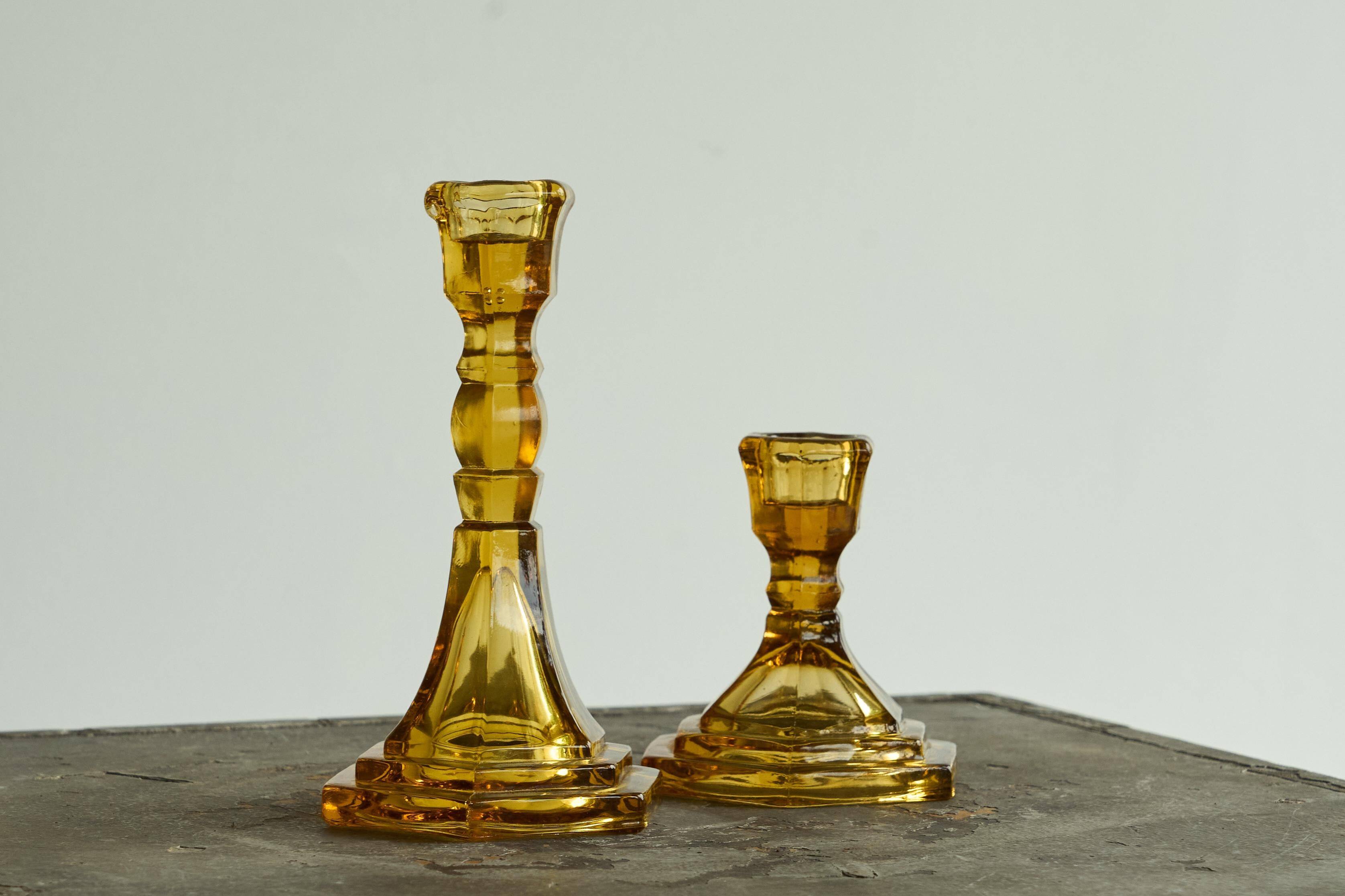 Pair of Art Deco candlesticks in pressed glass from the 1930s.