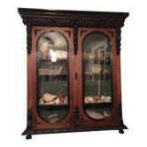 Large display cabinet in walnut veneer and blackened wood, 19th century.