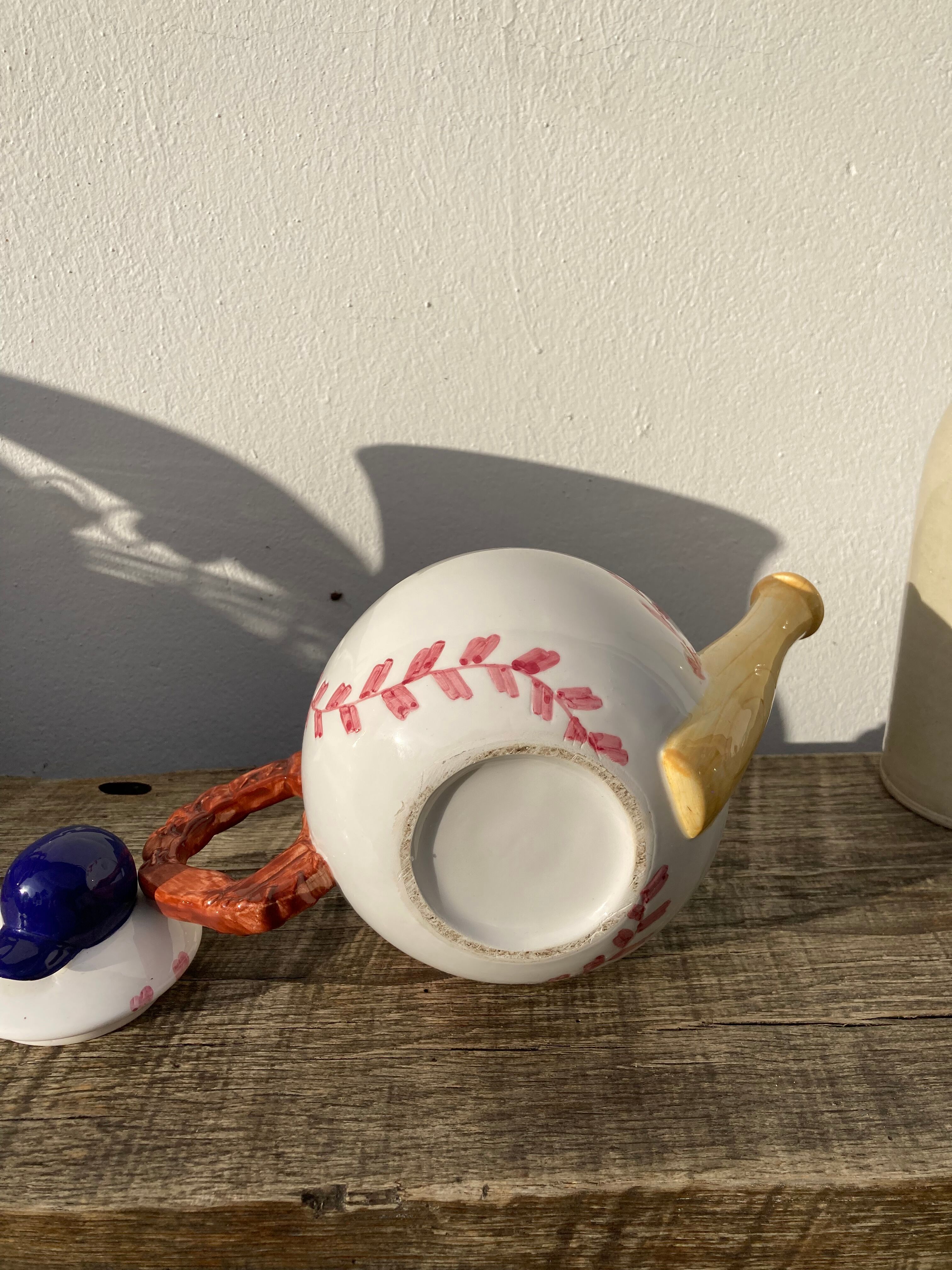 Teapot in white ceramic baseball