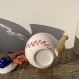 Teapot in white ceramic baseball