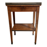 Occasional table in walnut burl and brass gallery.