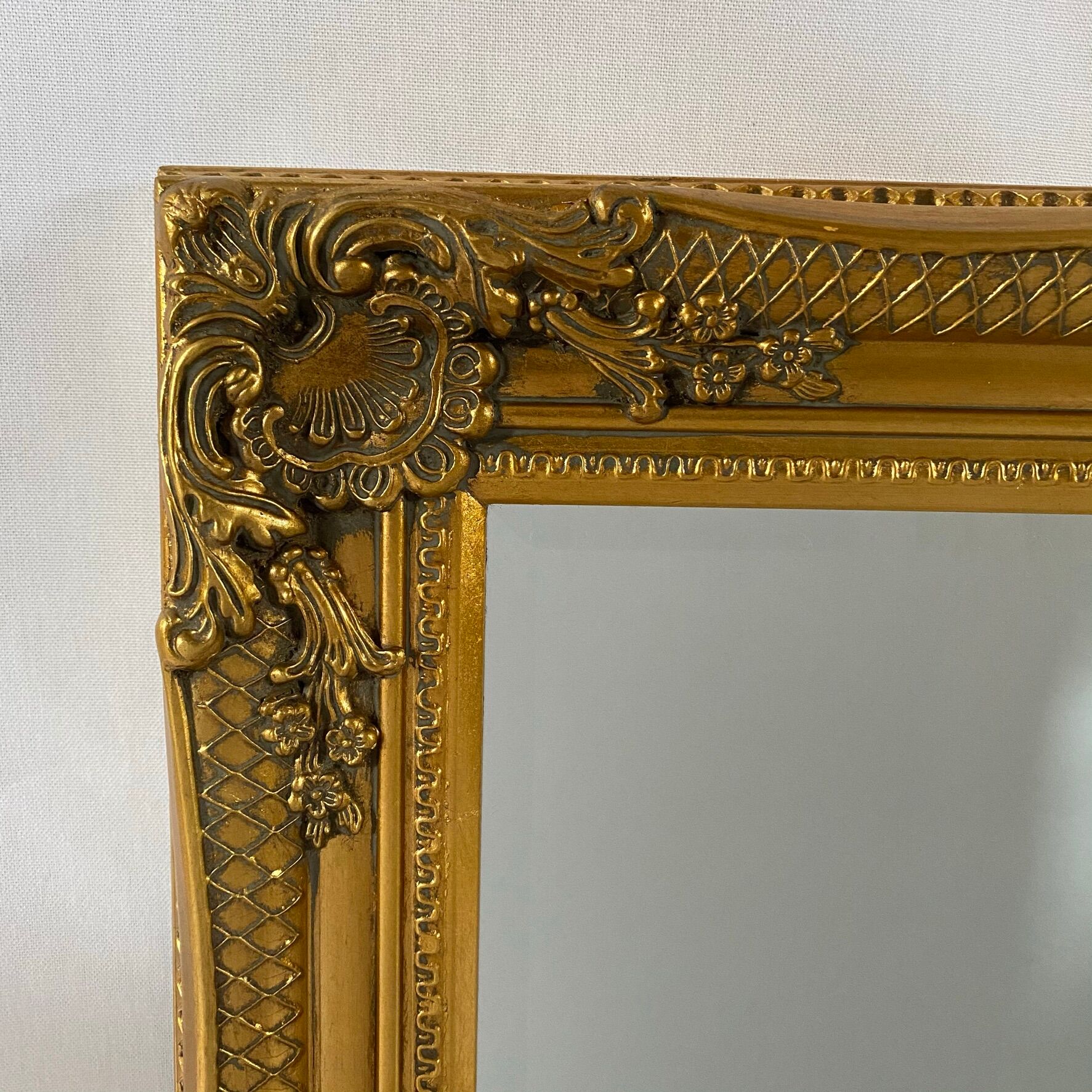Bevelled mirror, golden empire style 74x64cm