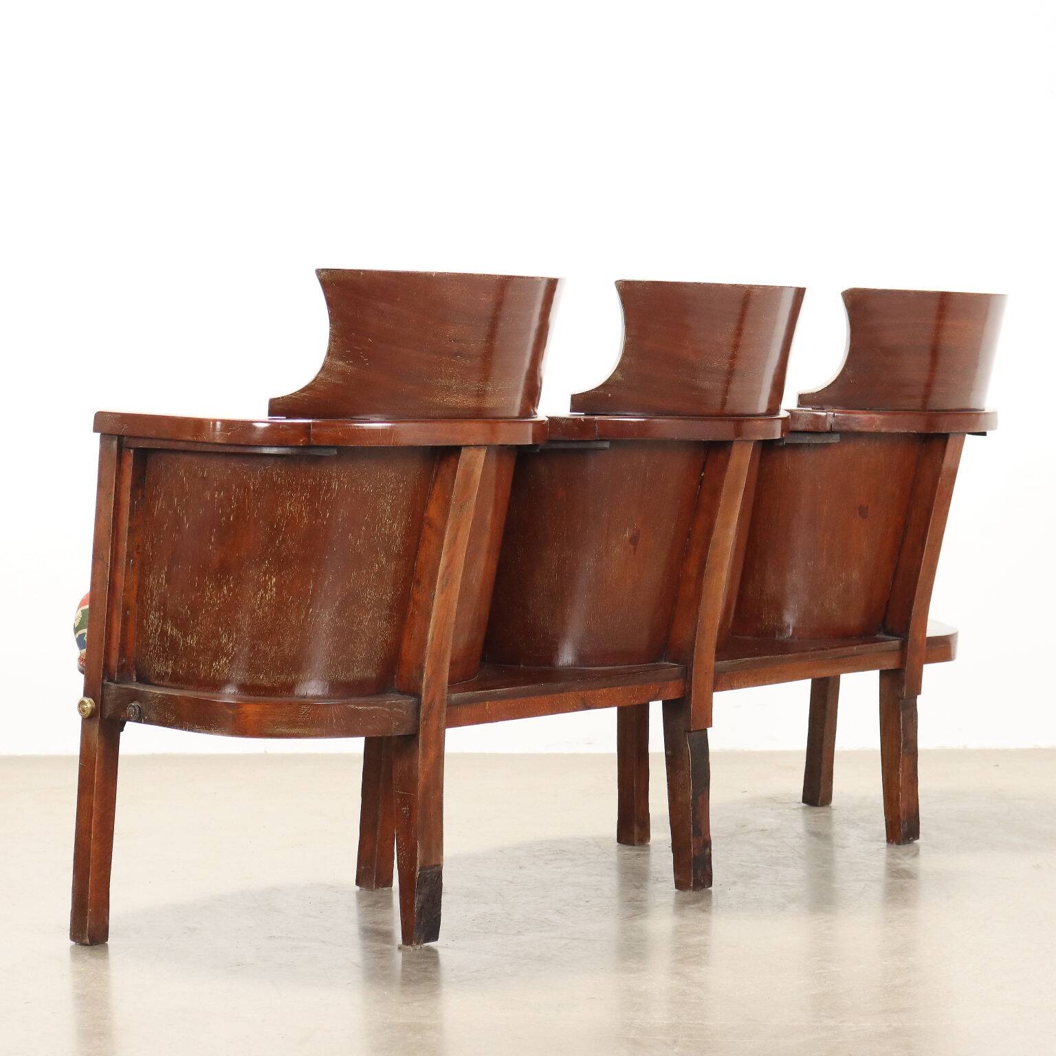 Three vintage cinema or theatre armchairs