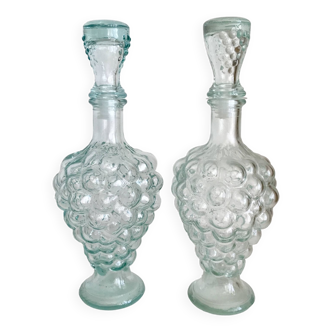 Pair of glass carafes with grape decoration