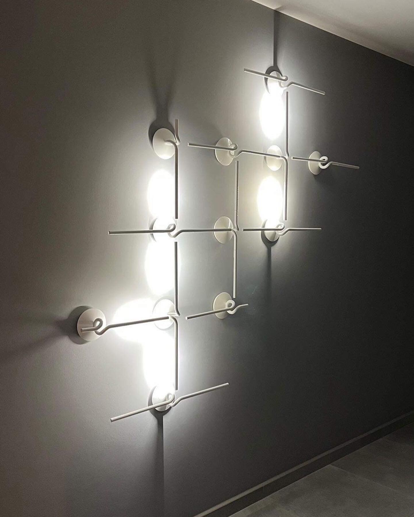 FLOS Light Spring wall lamps composition design