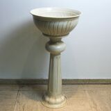 Planter on foot in enamelled metal