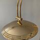 Articulated floor lamp from the 80s in gold metal