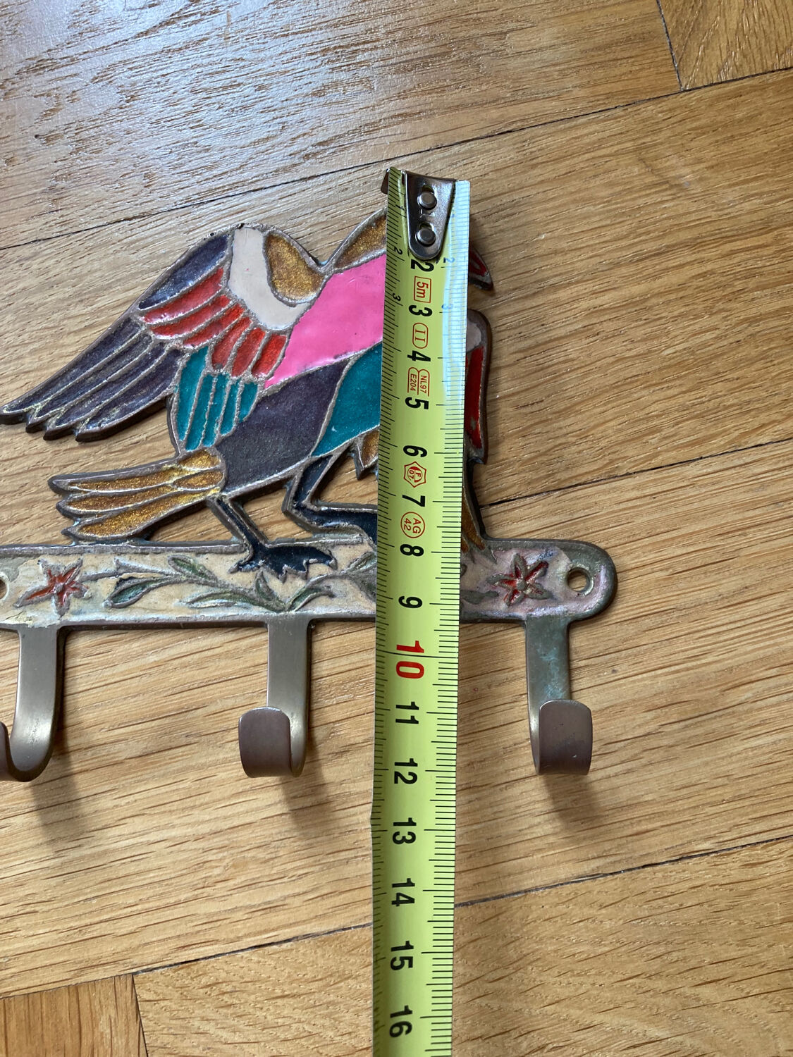 Hanging cloth bird brass