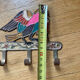 Hanging cloth bird brass