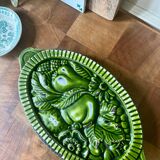 Old enameled cast iron trivet