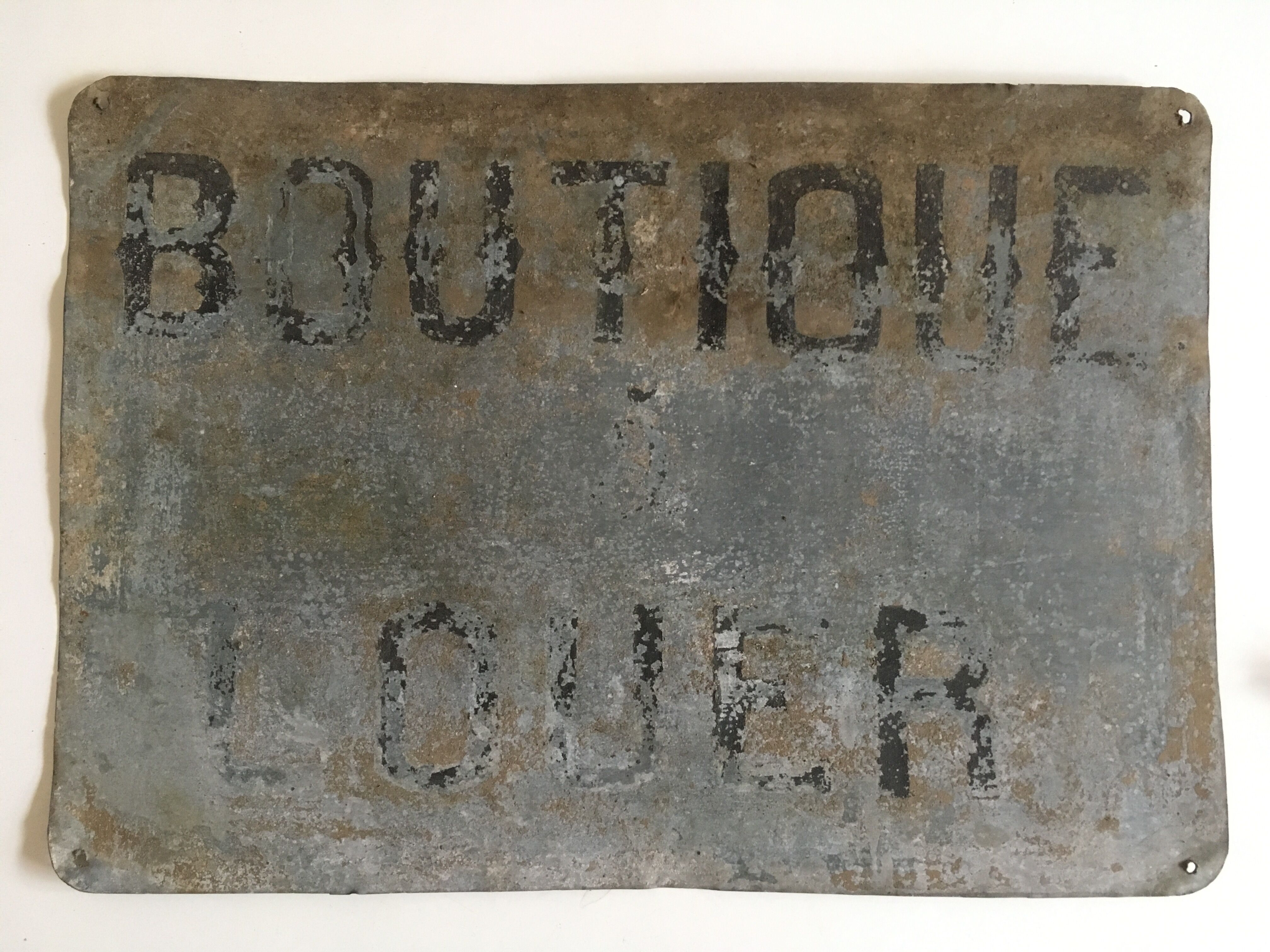 Plaque teaches A Rent in zinc 20s
