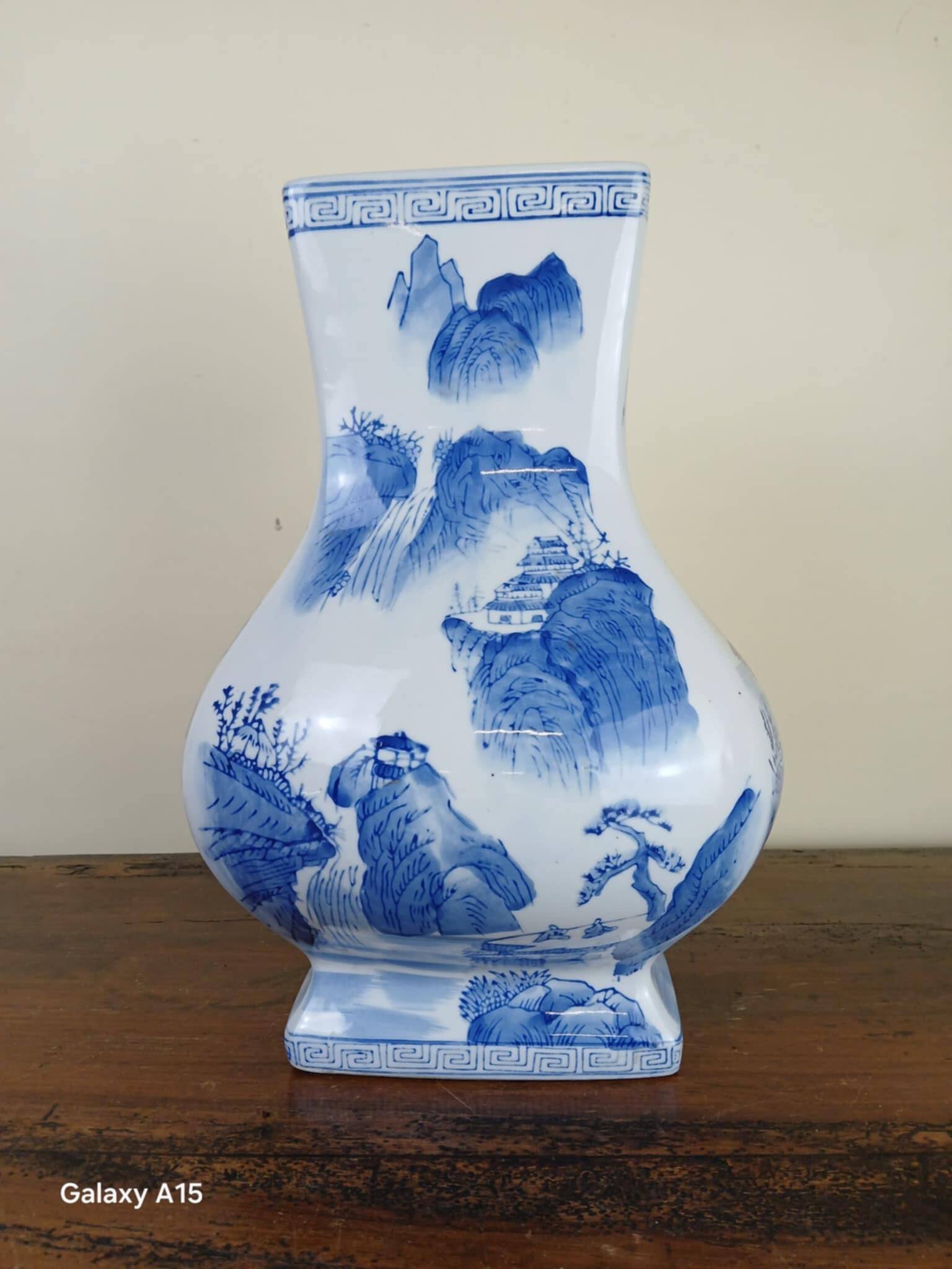 China circa 1920: porcelain vase with blue and white decoration