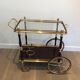 Rolling table in brass and mahogany with removable trays