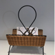 Rattan and black lacquered metal magazine rack