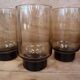 6 Smoked glasses with thick legs from the 70s