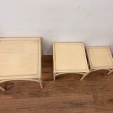 Three stackable rattan and bamboo Maugrion coffee tables