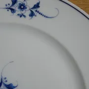 Fine Limoges porcelain dessert service: dish and 12 plates.