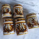 5 ceramic spice jars.