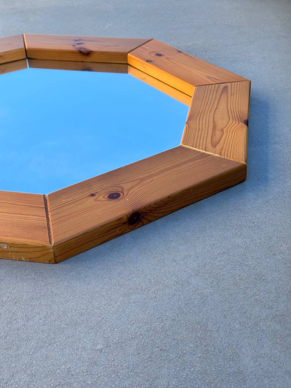 Octagonal pine mirror in 1980s Scandinavian design.