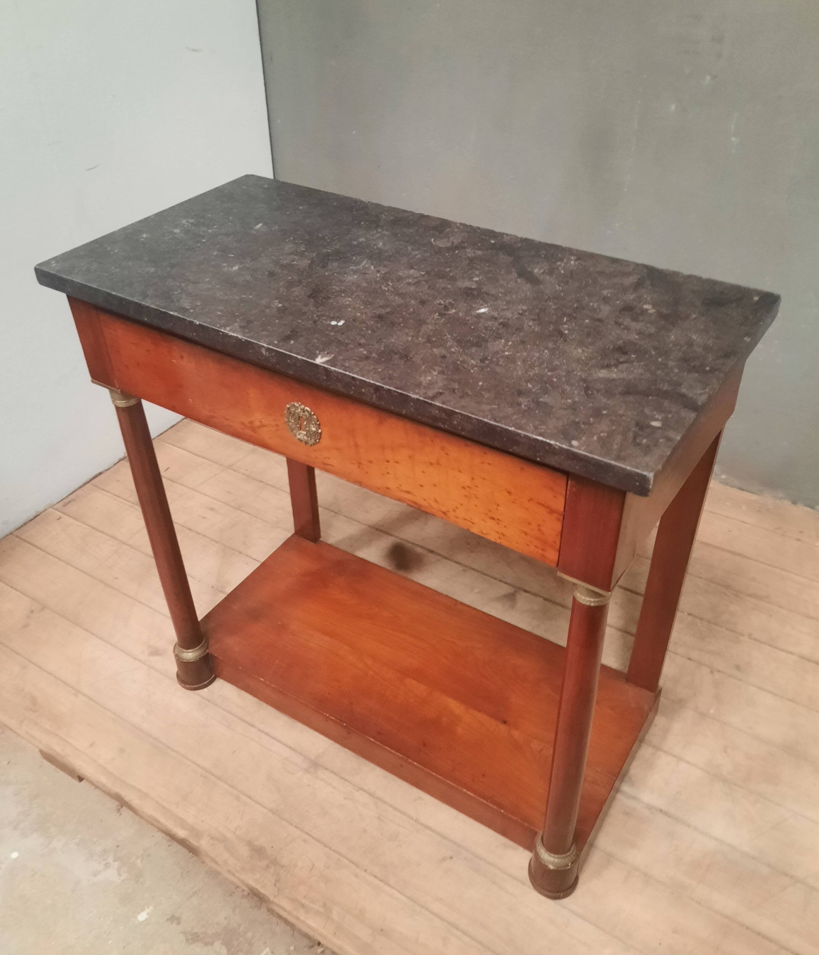 Empire period marble top console table